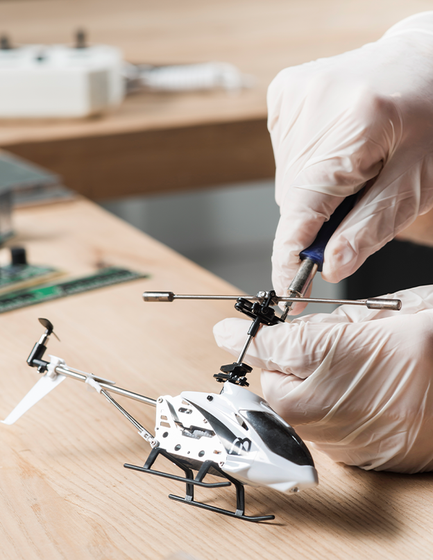 Engineer testing and debugging an electronic hardware prototype